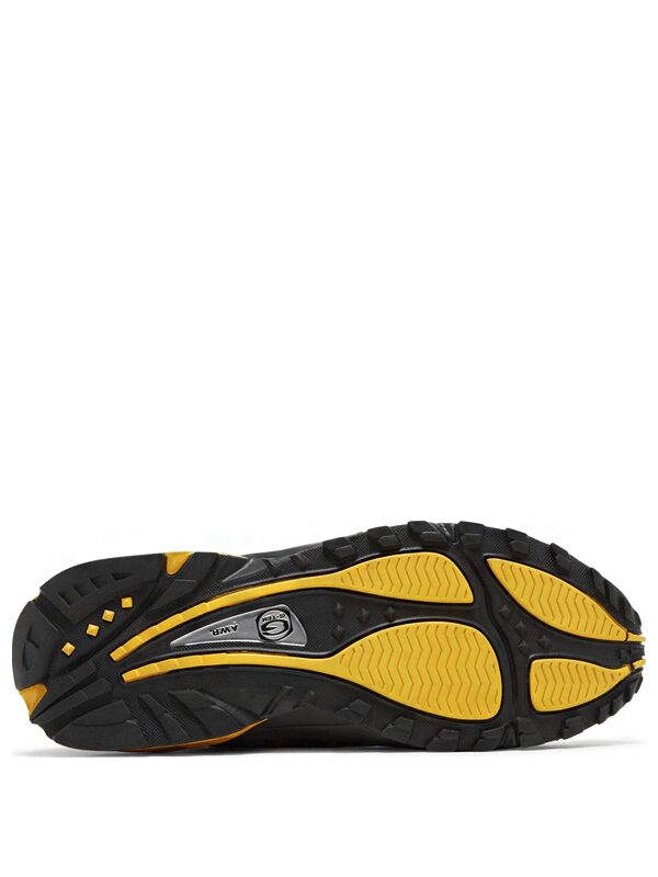 NOCTA x Nike Hot Step Air Terra Black and University Gold