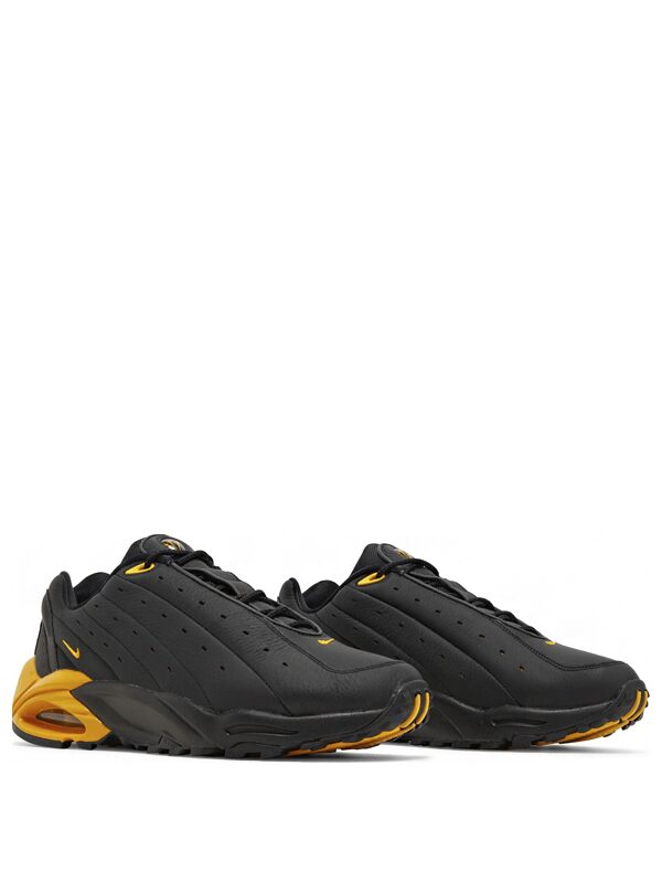 NOCTA x Nike Hot Step Air Terra Black and University Gold
