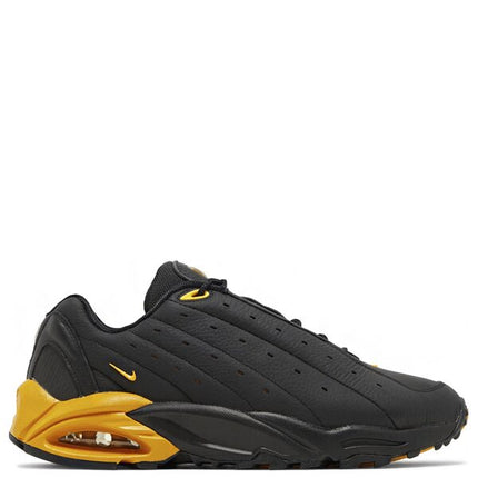 NOCTA x Nike Hot Step Air Terra Black and University Gold