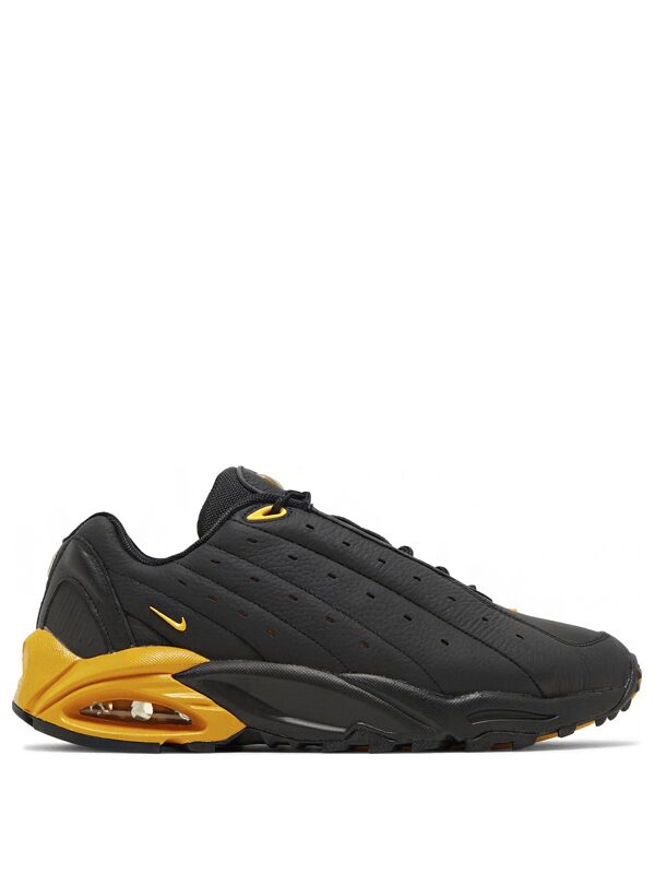 NOCTA x Nike Hot Step Air Terra Black and University Gold