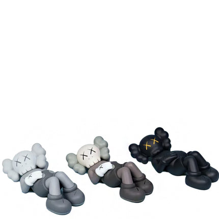 KAWS Holiday Japan Vinyl Figure Black/Brown/Grey Set
