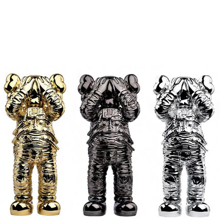 KAWS Holiday Space Figure Gold/Black/Silver Set