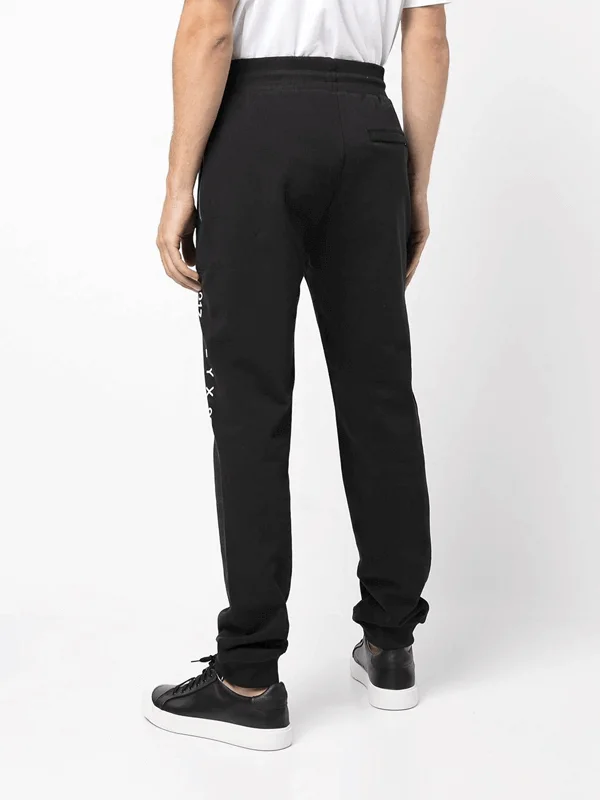 1017 ALYX 9SM Calca Esportiva com Estampa de Logo 1